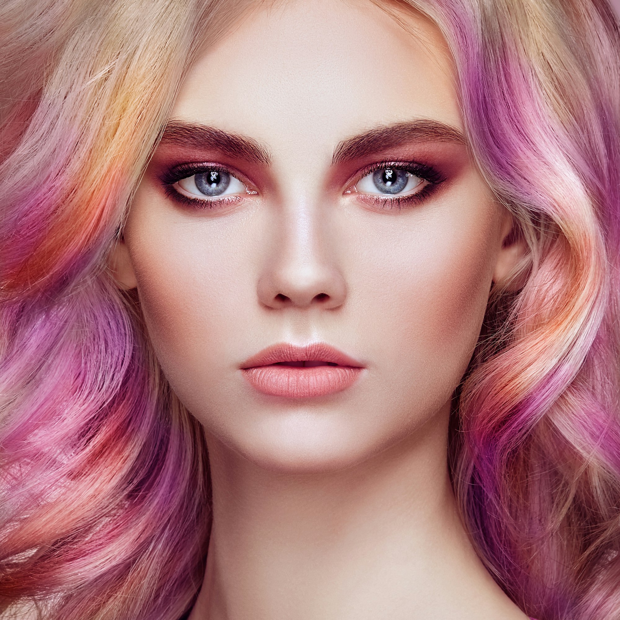 Beauty fashion model girl with colorful dyed hair