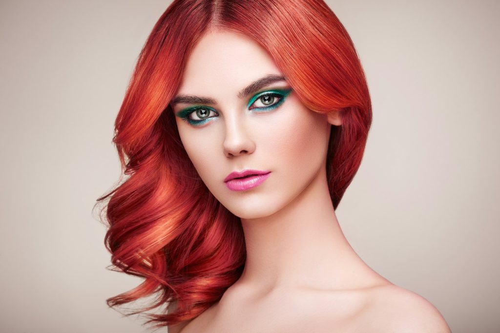 Beauty fashion model girl with colorful dyed hair