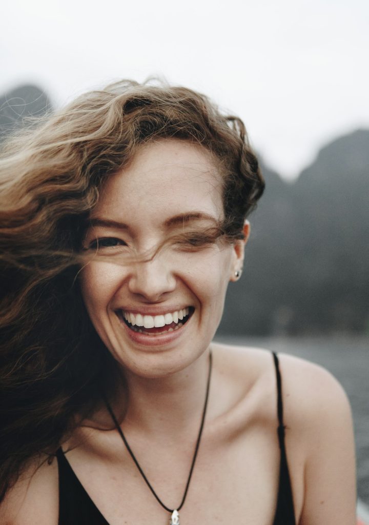 Portrait of a beautiful woman with curly hair