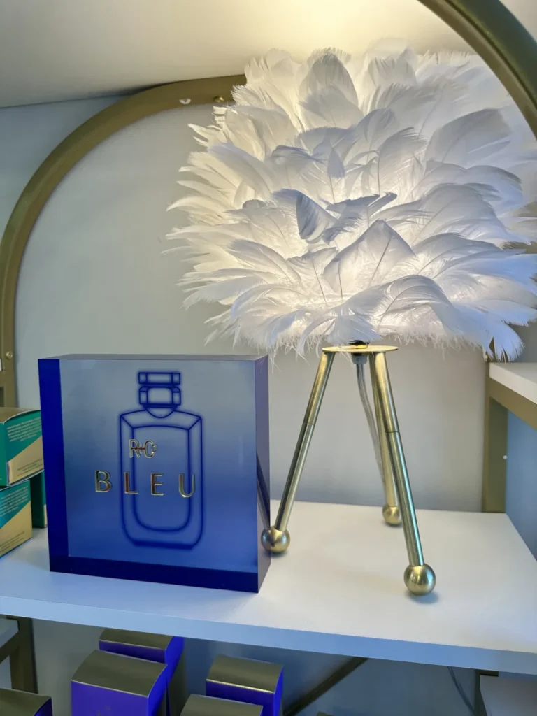 R+Co retail display, including R+Co Bleu, at Vamp Salon Extension Studio, a hair salon in Brentwood, CA
