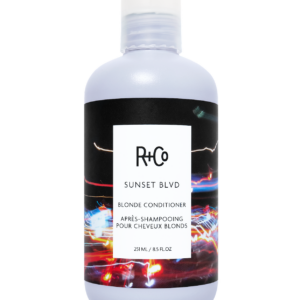 R+Co Sunset Blvd Blonde Conditioner bottle facing forward with white label and black cap; label shows product name and size (251 ml).