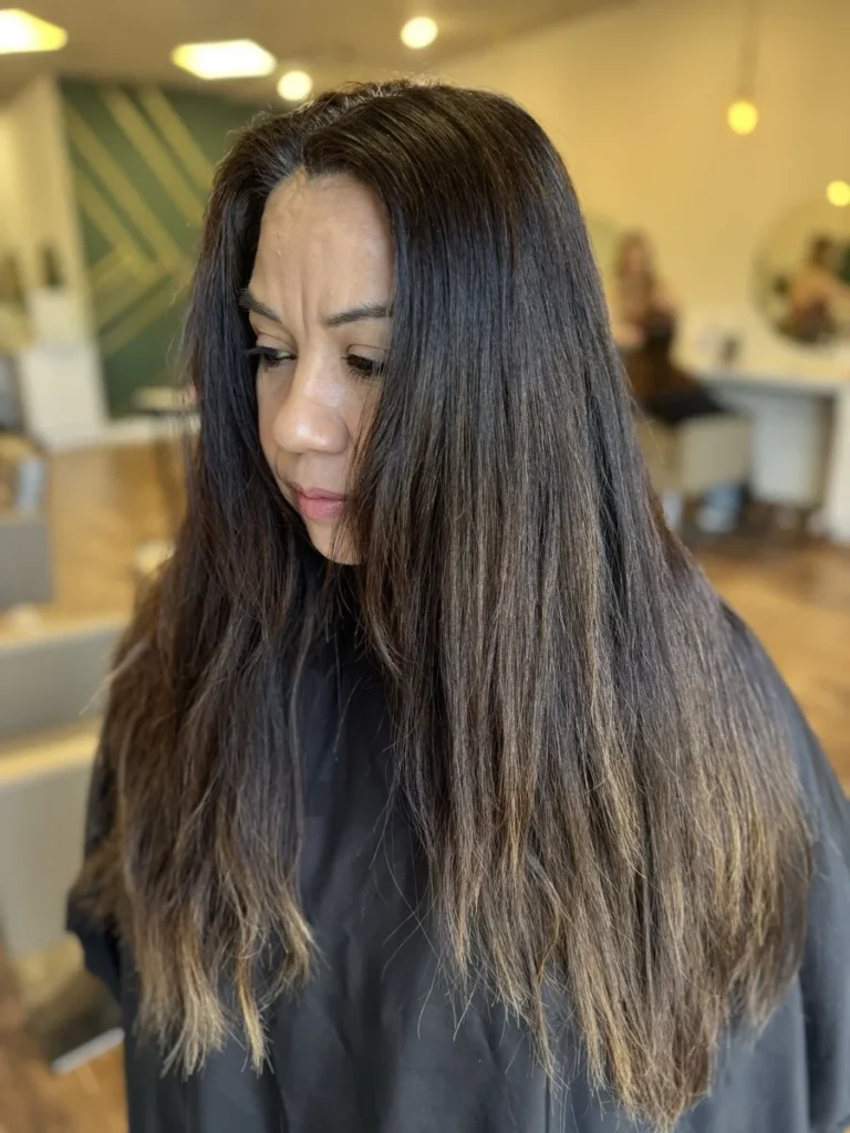 Before a hair color transformation at Vamp Salon in Brentwood, CA — flat, dull dark brown hair