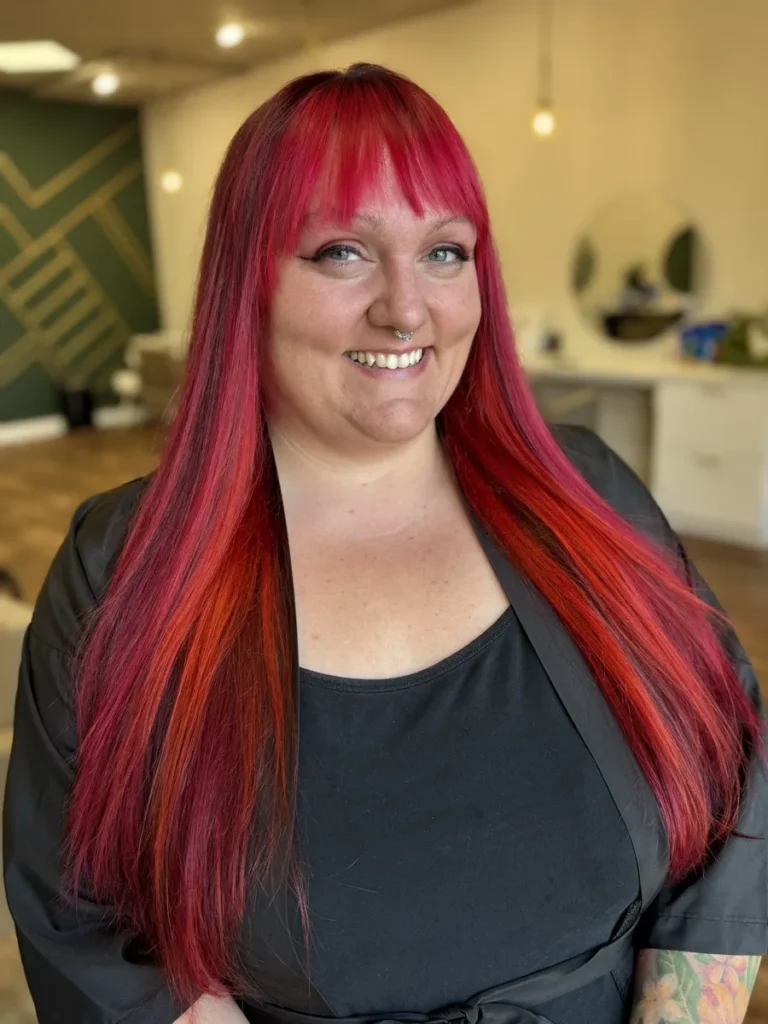 After a vivid color transformation at Vamp Salon in Brentwood, CA — vibrant, glossy red