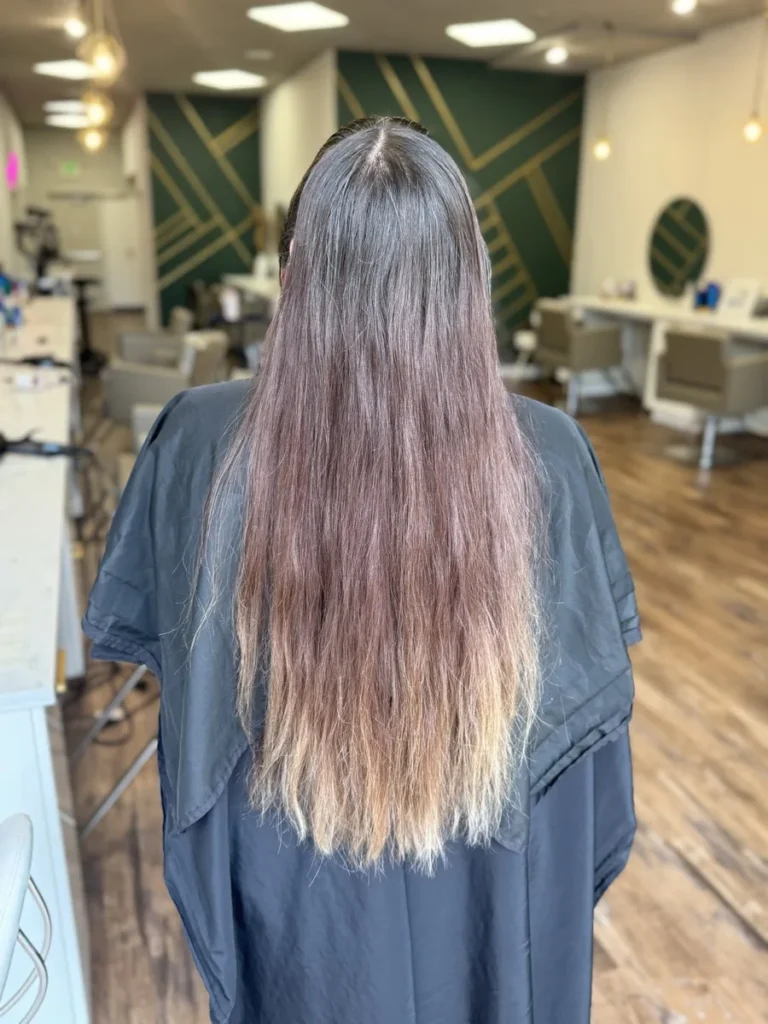 Before a vivid color transformation at Vamp Salon in Brentwood, CA — dull, faded, grown-out color
